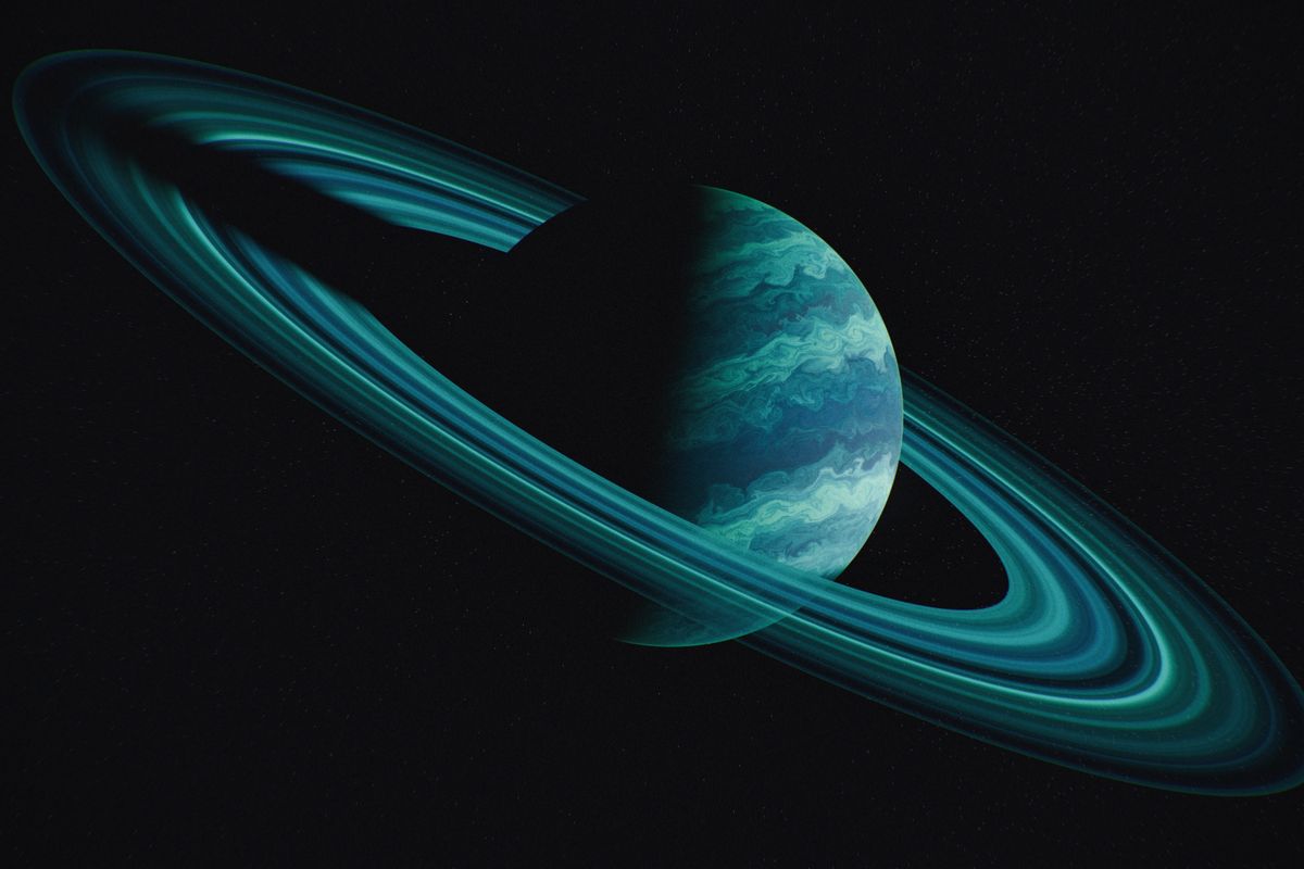 Fotografía de Saturno con sus anillos, mostrando el decágono de Saturno recién descubierto alrededor de su polo sur.